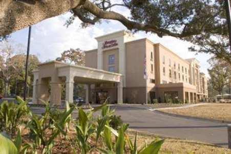 a large building in front of a building at Hampton Inn & Suites Mobile Providence Park/Airport in Mobile