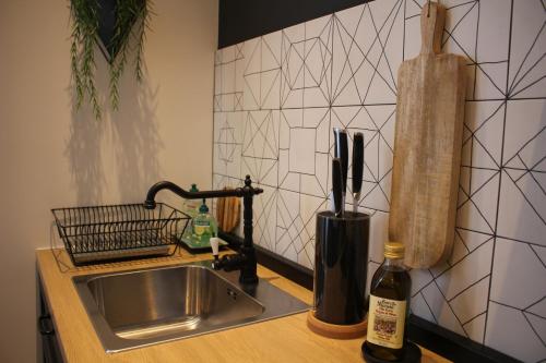 Una cocina o zona de cocina en Simple & Elegant Apartment