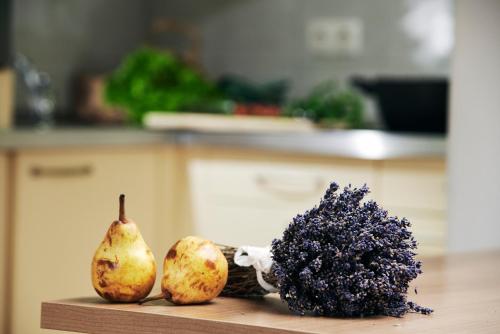 a counter with three different types of vegetables on it at Rooms & Restaurant Ostarija in Dolenjske Toplice