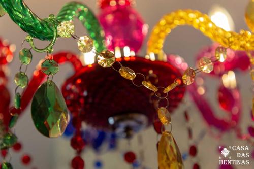a close up of a necklace with glass beads on it at Casa Rural as Bentinas in Milladoiro