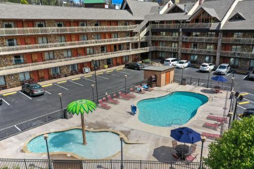 an overhead view of two pools in front of a hotel at Crossroads Inn & Suites in Gatlinburg
