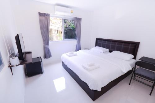 Postel nebo postele na pokoji v ubytování U-need Guesthouse95
