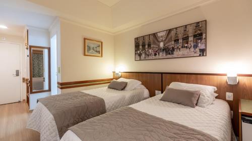 
Cama ou camas em um quarto em Hotel Bella Italia
