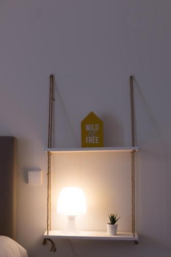 a shelf with a wild fire sign on it at Green Villas Douro in Gondomar