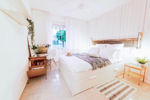 A bed or beds in a room at Lacatorce Apartment