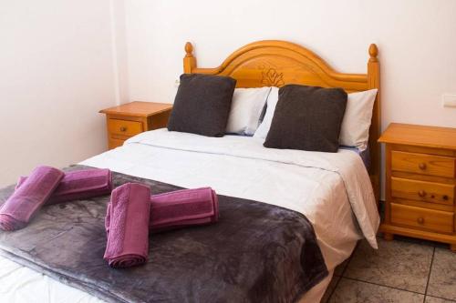 Postel nebo postele na pokoji v ubytování APARTAMENTO LOS NARCISOS