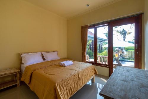 Gallery image of Dicky Guest House 2 Batu Bolong in Canggu
