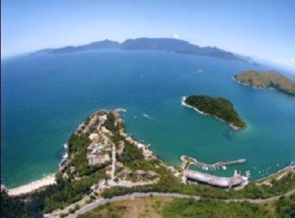 an aerial view of an island in a body of water at Vista Espetacular Porto Real suítes in Mangaratiba