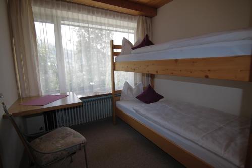 Postel nebo postele na pokoji v ubytování Apartments Ausfernerhof