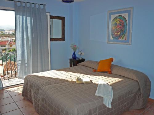 Postel nebo postele na pokoji v ubytování Hotel Mayarí