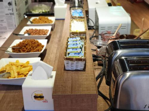 a buffet line with different types of food on it at 樂亞亞奇文旅 in Luodong