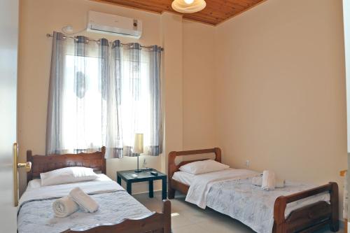 Posteľ alebo postele v izbe v ubytovaní George apartment