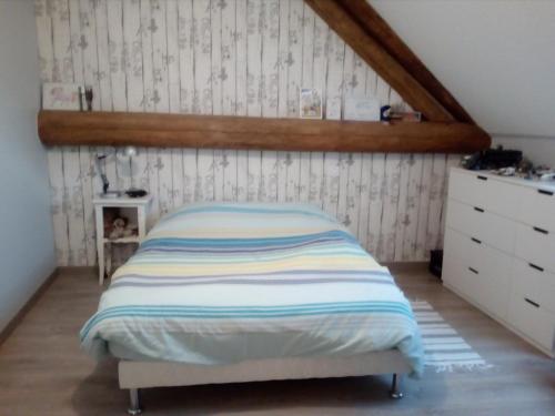 Postel nebo postele na pokoji v ubytování Chambres chez l habitant