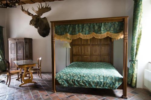 Postel nebo postele na pokoji v ubytování Zamek Zabreh