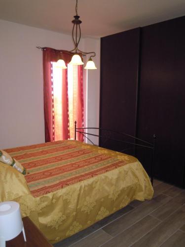 Una cama o camas en una habitación de agriturismo Piccolo Albero