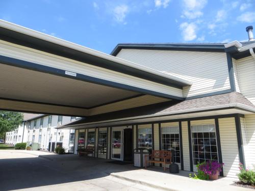 awning over the entrance to a building at Ramada by Wyndham Springfield North in Springfield