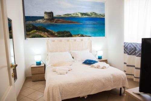 Ένα ή περισσότερα κρεβάτια σε δωμάτιο στο Villa Diana affitta camere
