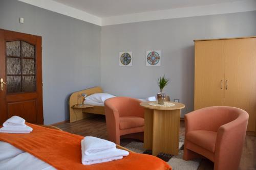 Postel nebo postele na pokoji v ubytování Hotel Paradies