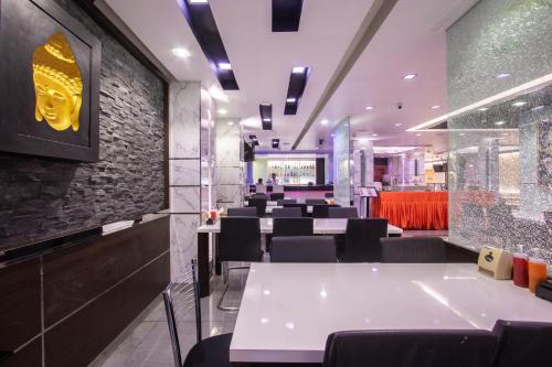 Χώρος καθιστικού στο Gusto Pratunam Hotel