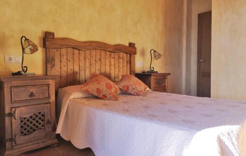 Ένα ή περισσότερα κρεβάτια σε δωμάτιο στο El Algarrobo by CasaTuristica