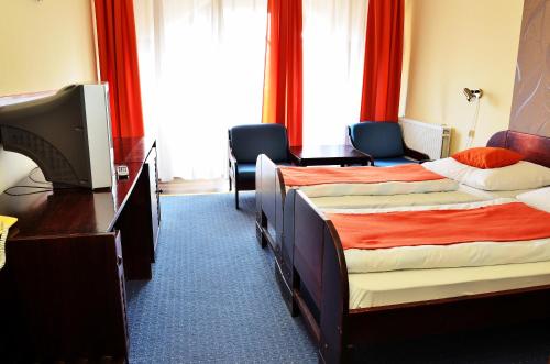Postel nebo postele na pokoji v ubytování Hotel Solar