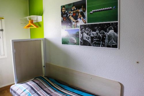 Postel nebo postele na pokoji v ubytování Hoteleco Sud Agen Autoroute