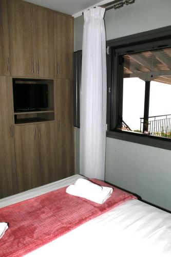 Cama o camas de una habitación en Pure Blue
