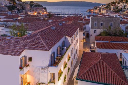 a view of a city at night at Hotel Leto Hydra in Hydra