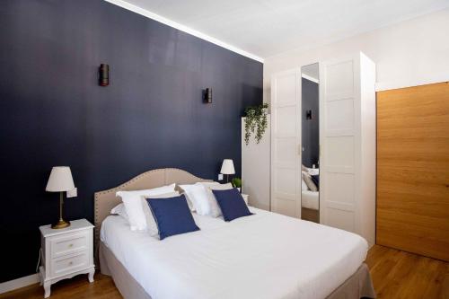 Posteľ alebo postele v izbe v ubytovaní Elégant appartement en plein coeur de Cabourg - Les locations de Proust