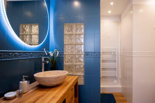 Ett badrum på Elégant appartement en plein coeur de Cabourg - Les locations de Proust