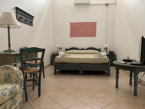 TV a/nebo společenská místnost v ubytování Residence Hotel Monte Ricciu