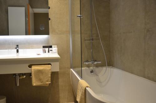 Koupelna v ubytování Hotel Arcato
