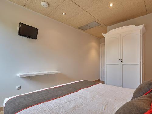 Postel nebo postele na pokoji v ubytování Hostal Nobadis