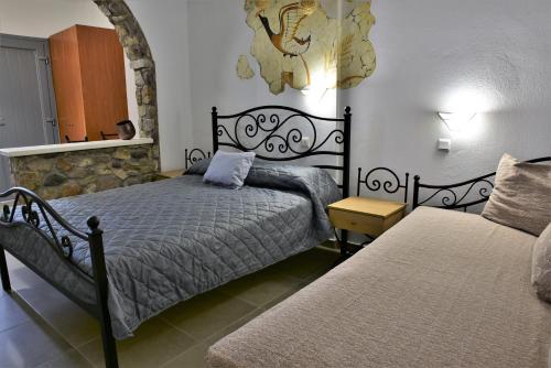 Krevet ili kreveti u jedinici u okviru objekta Kafouros Hotel