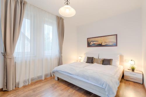 Posteľ alebo postele v izbe v ubytovaní Fortuna 7 Apartments