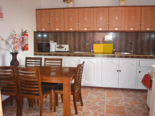 Kuchyň nebo kuchyňský kout v ubytování Villa Prescilla