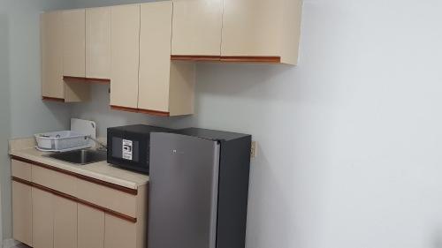 Η κουζίνα ή μικρή κουζίνα στο Executive Suites