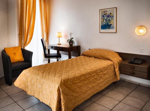Postel nebo postele na pokoji v ubytování Hotel dell'Angelo