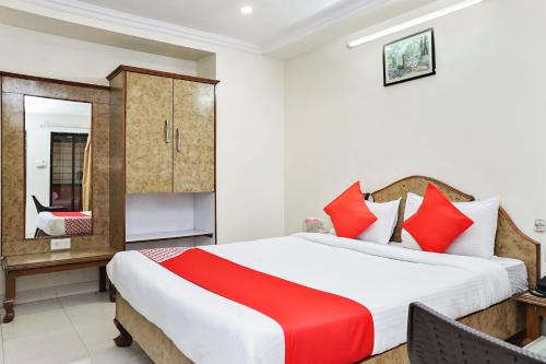 Hotel Rajdeep房間的床