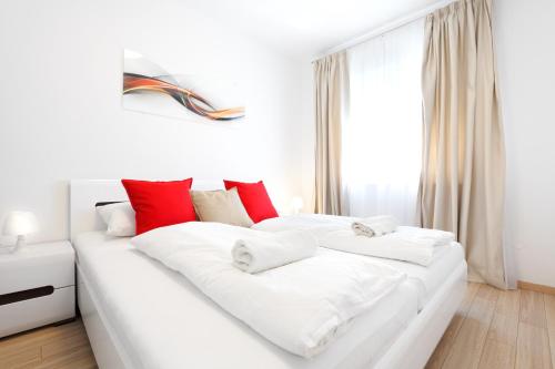 En eller flere senge i et værelse på Bellevue apartment