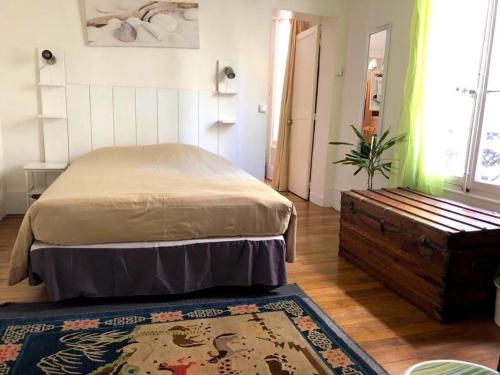 Кровать или кровати в номере L'appartement Boulnois