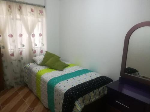 Ένα ή περισσότερα κρεβάτια σε δωμάτιο στο Apartamento Familiar Fantástico!!! en Sabaneta
