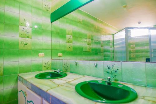 Ett badrum på North Star Hostal Guayaquil