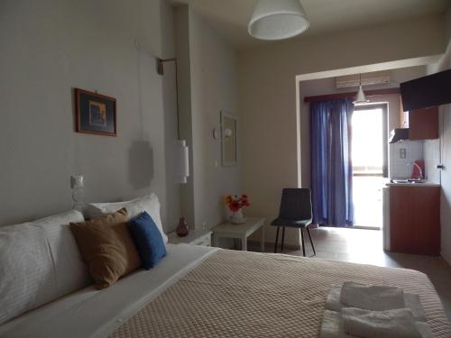 Postel nebo postele na pokoji v ubytování Posidonio Hotel