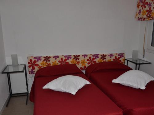 Letto o letti in una camera di B&B La Via dell'Ambra