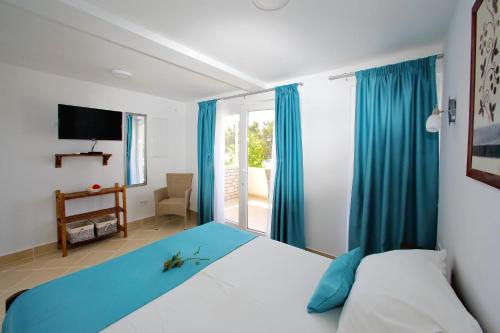 Cama o camas de una habitación en Apartments Brankica