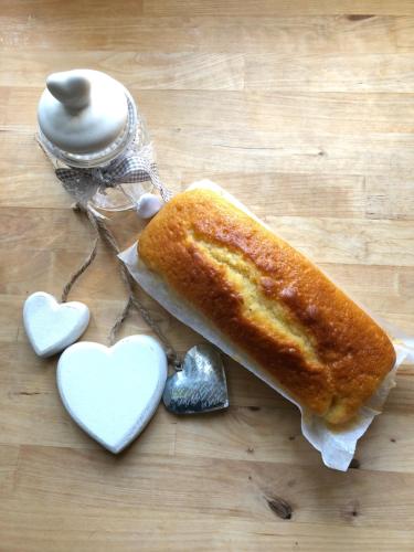 a piece of bread and three hearts on a table at Hotel Lux in Cesenatico