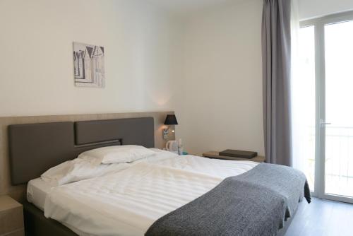 Letto o letti in una camera di Hotel Venezia