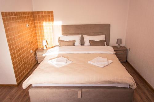 Apartmani Stari Gajにあるベッド