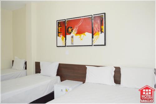 Postel nebo postele na pokoji v ubytování Hotel e Restaurante Araújo